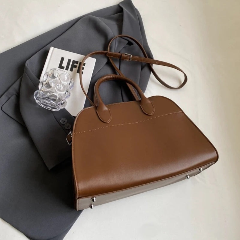 Exquisite, raffinierte, strukturierte Handtasche für Damen